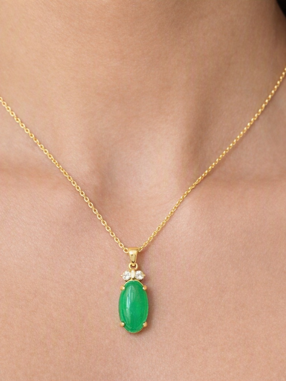 Gold Necklace with Green Oval Pendant and Crystal Accents